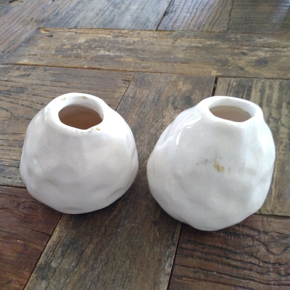 2 Ceramic bud vases     about 3 inches tall and as wide